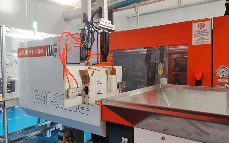 Chen Hsong automatic injection molding machine for plastic 2K dual glue cartridge mass production workshop